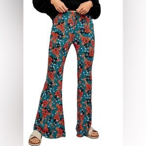 NWT! Free People CAN'T TAKE MY EYES OFF OF YOU FLORAL FLARE PANTS MULTI COMBO